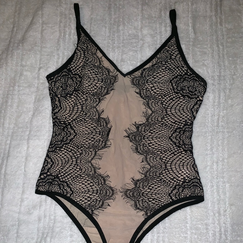 Sheer black and nude bodysuit